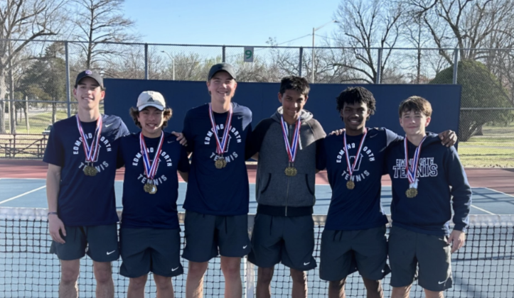 The Edmond North boys' tennis team poses for a picture at the Ponca City Tournament with their first-place medals. Courtesy of Edmond North Athletics.