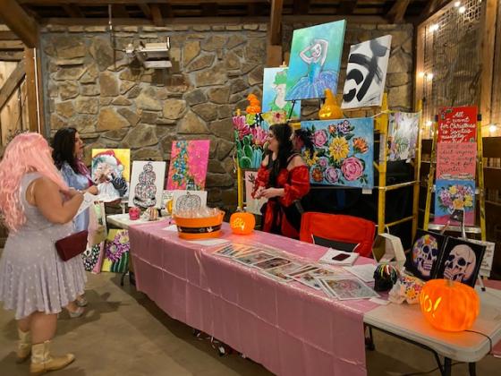 Third Annual Trick or Treat Ball.  The event was a huge success. Nine boo-tiques, 20 total sponsors, and 65 women in costume gathered at the Harn Homestead museum to celebrate creativity and shopping local. Beautiful evening.