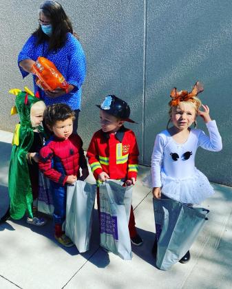 Francis Tuttle Technology Center hosted a halloween parade for the children in its Child Development Center. Students and staff lined the sidewalk to distribute candy to the little goblins and ghouls.