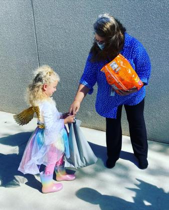 Francis Tuttle Technology Center hosted a halloween parade for the children in its Child Development Center. Students and staff lined the sidewalk to distribute candy to the little goblins and ghouls.
