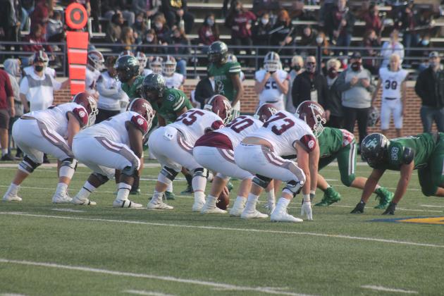 The Santa Fe defense lines up against the Jenks offensive line