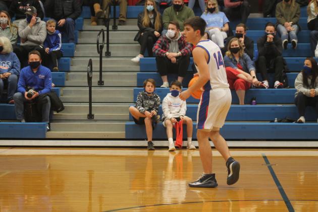 Carter Hodson brings the ball up the court