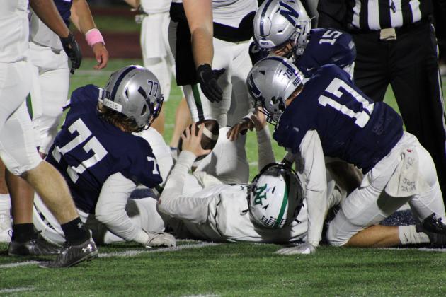 Edmond North defense making a stop against Norman North in the second half.