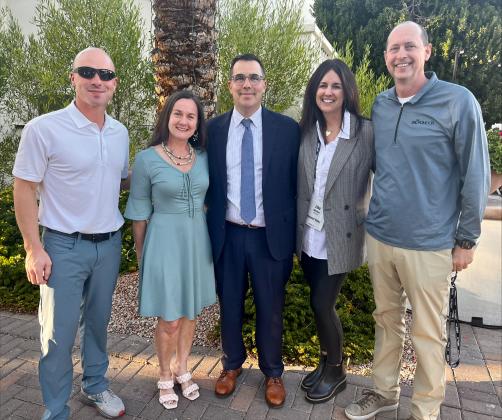 Left to Right: Josh Moore, Edmond City Council, Jennifer Seaton, Edmond Tourism Director, Lew Sherr, Chief Executive Officer, Community Tennis, USTA David Minihan, Co-Director of Edmond Center Court, Lisa Minihan, Co-Director of Edmond Center Court pose for a photo during the recent USTA convention.