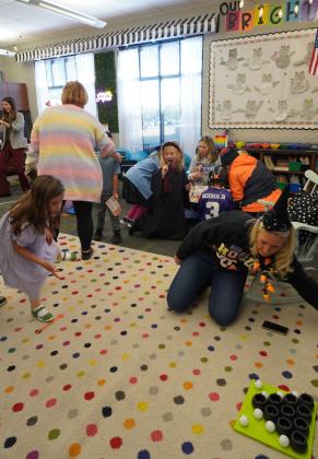 Second grader Ailey James plays a fun Halloween game