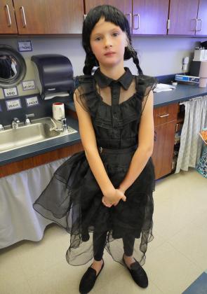 Second grader Aislinn Roberts dressed as Wednesday.