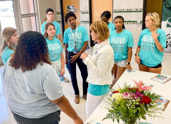Student ambassadors get instructions from Anita Nash, Edmond Public Schools Foundation programs and operations manager, about volunteering for Edmond Public Schools Convocation. Photo provided by Edmond Public Schools Foundation.