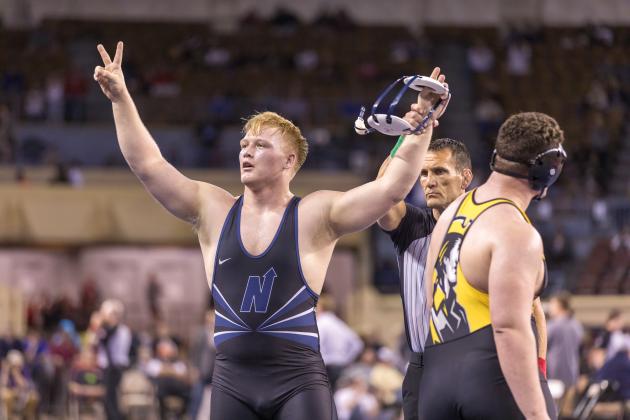 Edmond North's Ricky Thomas celebrates his state title victory over Sand Springs' Mason Harris in the 285-pound match. Photo taken by Brent Fuchs.