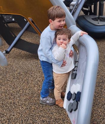 Bowen & Briggs, sharing some brotherly love on the chilly day as the new generation of Stephenson Park goers. Photo Erin Stevens.