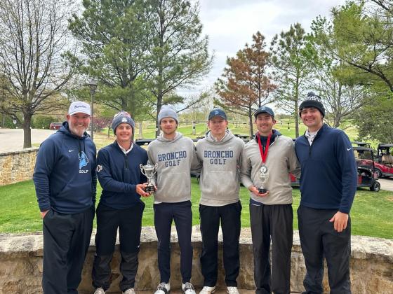 UCO men's golf team with the championship trophy at the Showdown at Shangri-La. Tuesday, April 2. Courtesy of UCO Photo Services.