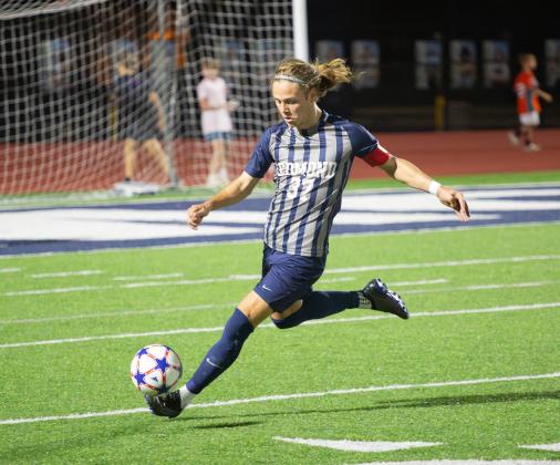 Edmond North’s Reese McManis works against Capitol Hill on Friday, April 12. Photo by Drew Harmon.