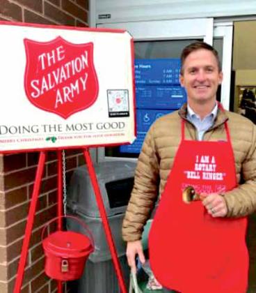 Rotary Club of Edmond member, Tom Rosser rings a bell for The Salvation Army’s annual kettle drive at the Danforth and Kelly Walmart in Edmond on December 13..