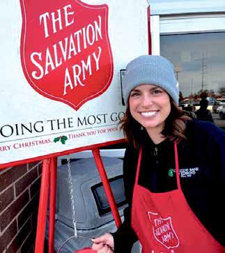 Rotary Club of Edmond member, Whitney Randall rings a bell for The Salvation Army’s annual kettle drive at the Danforth and Kelly Walmart in Edmond on December 13.